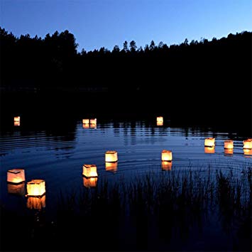 Lanterns float on a river